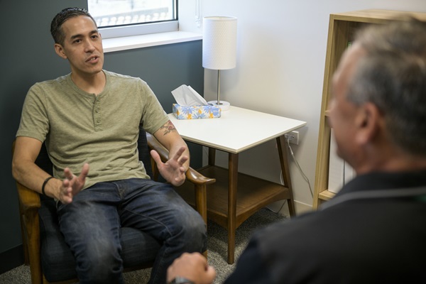 Veteran talking to counselor.