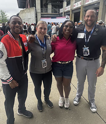 WWP warrior Chante Franco with others at the Indy 500.