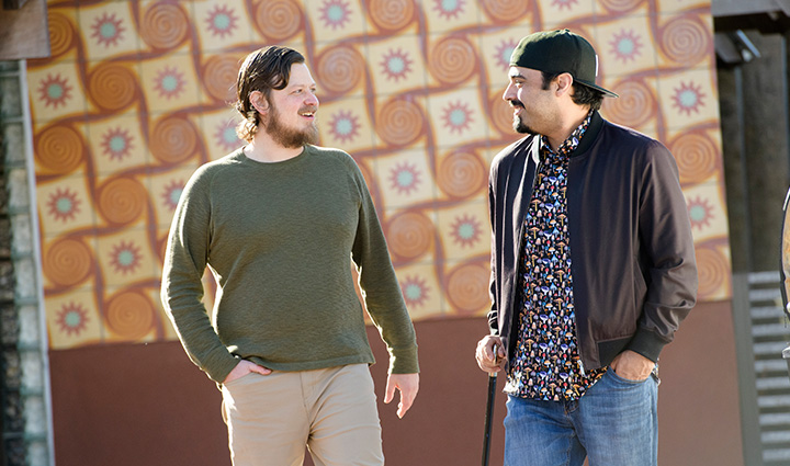 Warriors Nick Morrison and Sal Gonzalez stand outside having a conversation.