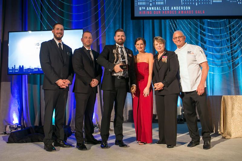 WWP representatives pose with the Wounded Veteran and Military Caregiver Employment Award.